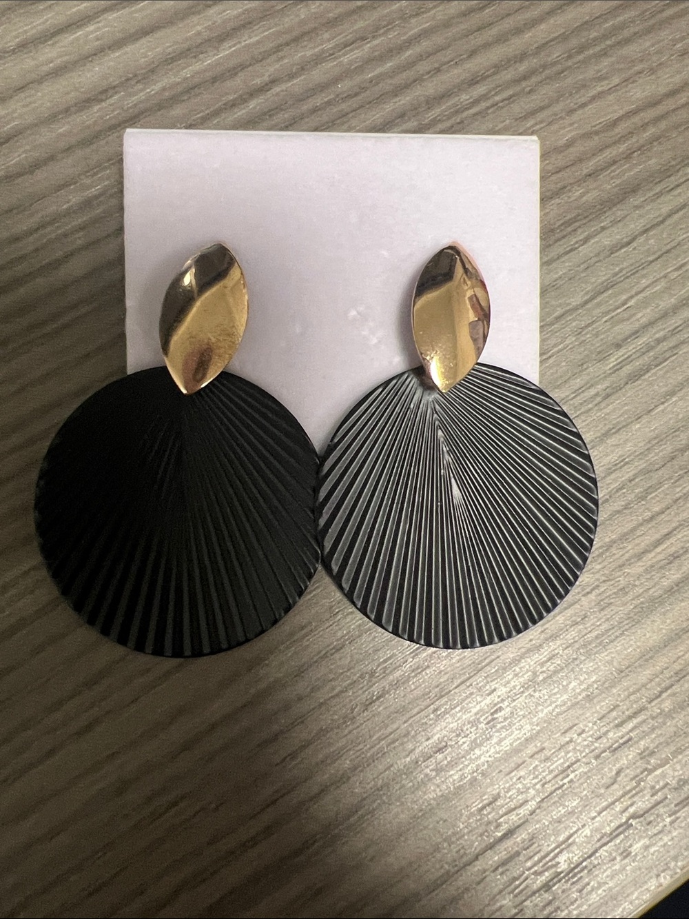 Textured Black Disc Drop Earrings with Gold Accents